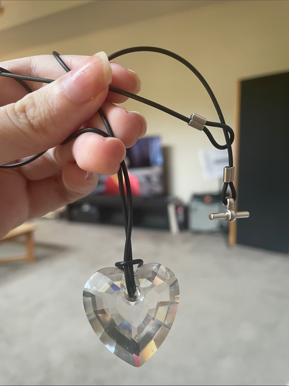 Like new Swarovski heart necklace on rope cord